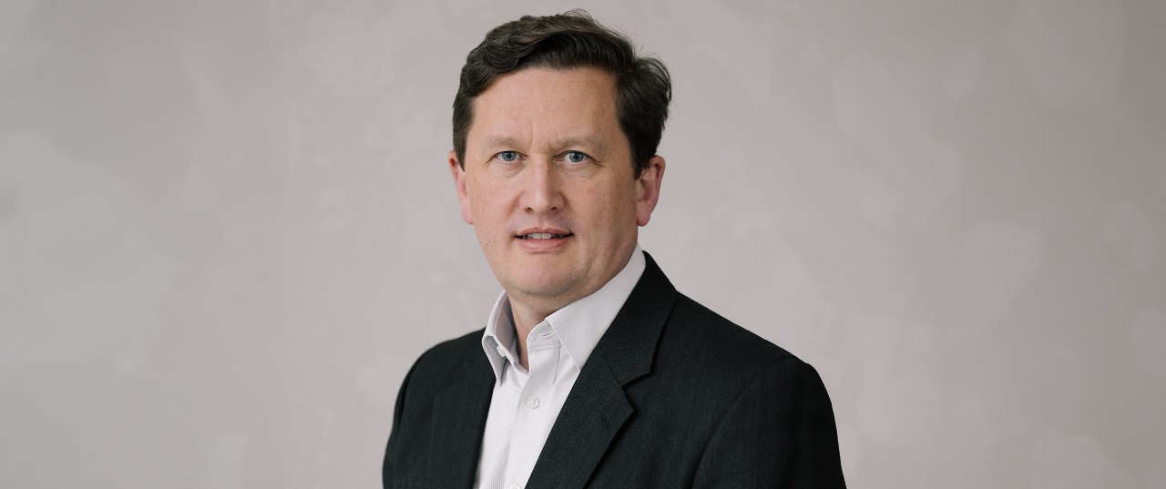 Headshot of Adam Key, Bridgepoint