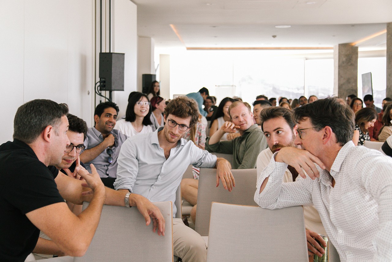 Photo - team member attending presentation