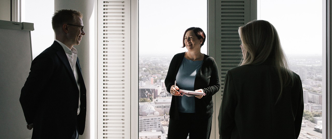 Photo - team members in conversation