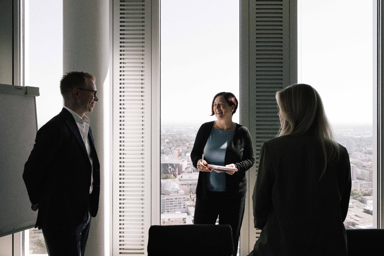 Photo - team members in conversation