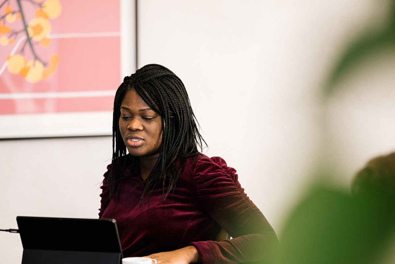 Photo - team member attending a meeting