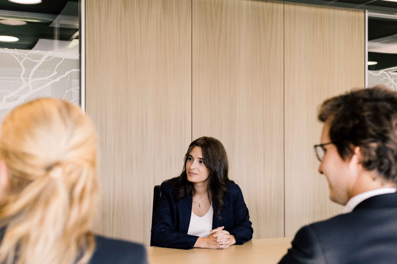 Photo - team members in conversation