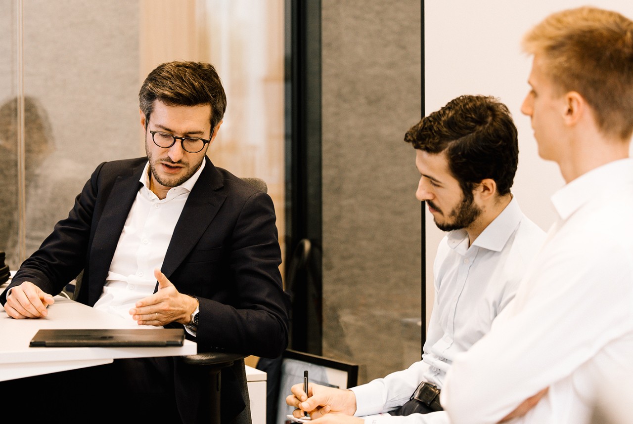 Photo - team members in conversation