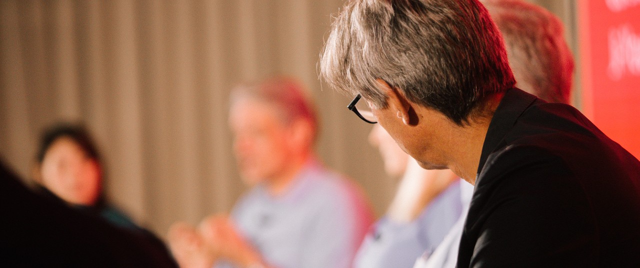 Photo - team members in conversation